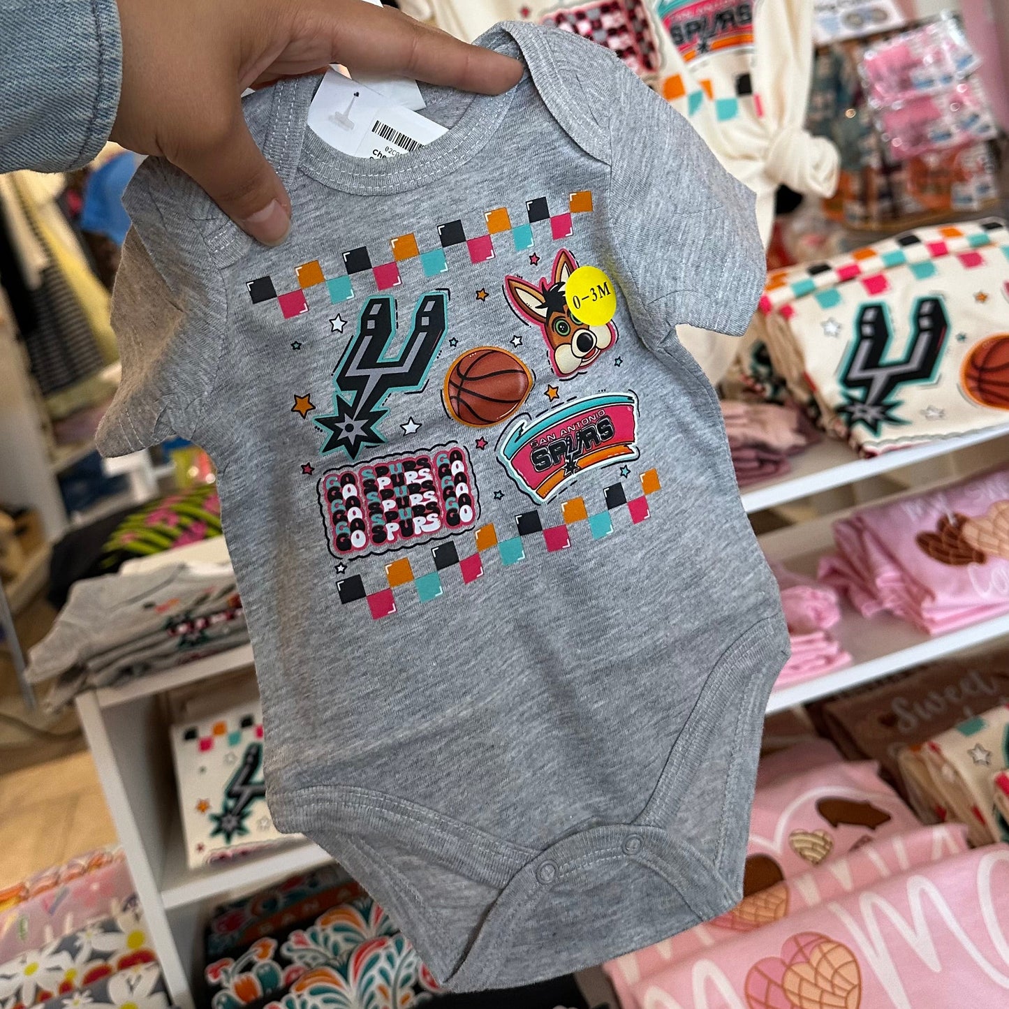 Checkered Spurs onesie ￼