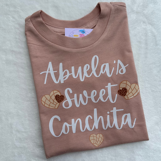Abuela’s sweet Conchita Peach Toddler Tee