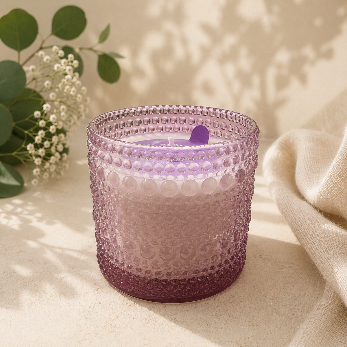 Purple polkadot candle
