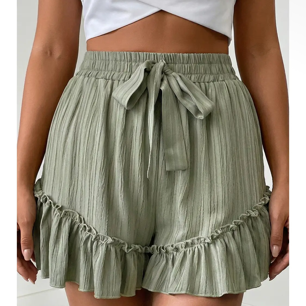 Knot Textured Tie Waist Ruffle
Hem Shorts